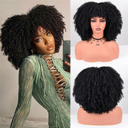 Vitorish front view showing bangs and full afro benefit: flattering face frame