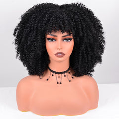 Vitorish side profile highlighting short kinky curls benefit: natural silhouette