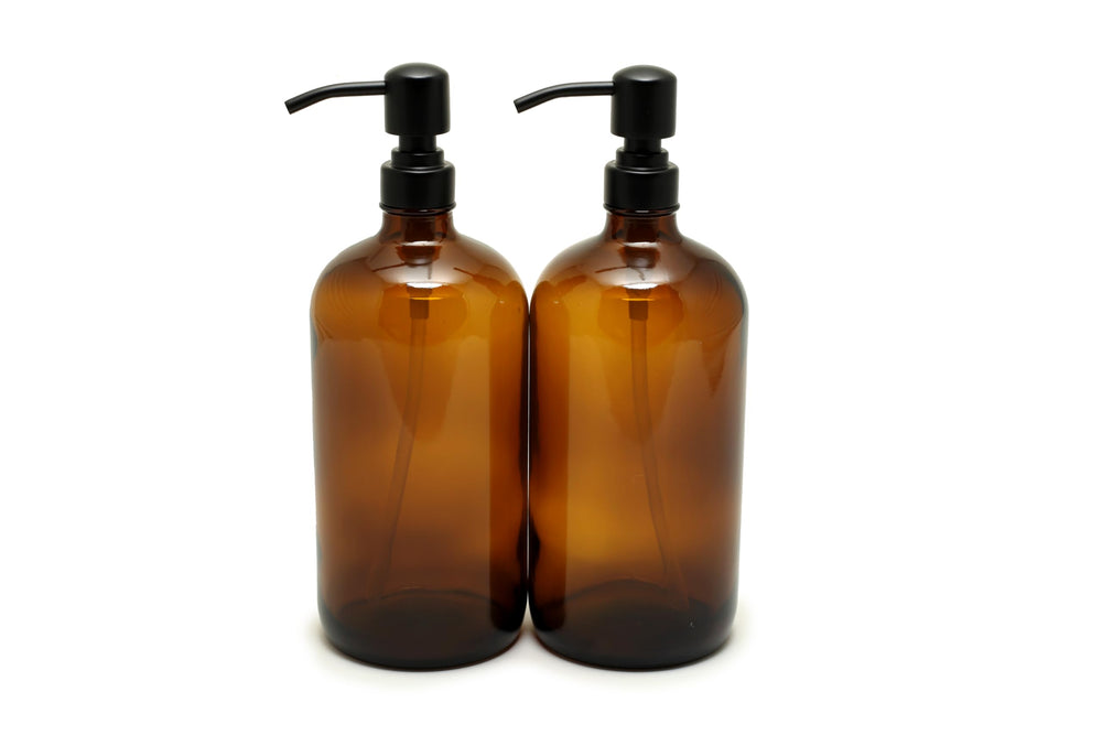Vivaplex front view of two 32 oz amber glass bottles showing capacity and label area