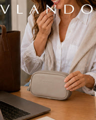 VLANDO interior pockets holding lipstick and brushes for orderly storage