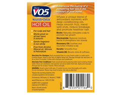 VO5 treatment poured into hands illustrating easy application and control