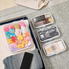 WELPIRT small pouch filled with cables and toiletries for tidy storage
