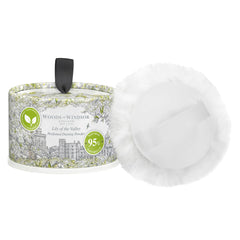 Woods of Windsor open tin with soft puff demonstrating easy, even application
