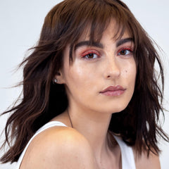 XMONDO spray in action on damp hair creating instant texture