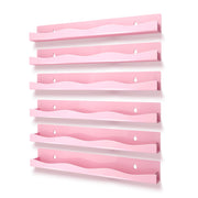 YMVV front view of pink shelf showing neat six-bottle display and easy color selection
