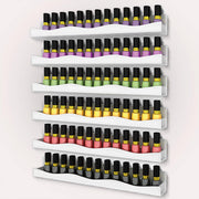 YMVV white acrylic rack front view showing neat polish rows and clear color display