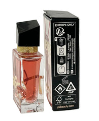 Yves Saint Laurent mini held in hand demonstrating the 7.5 ml pocket-sized convenience