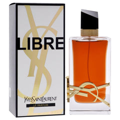 Yves Saint Laurent 3 oz bottle beside common objects indicating compact, travel-friendly size