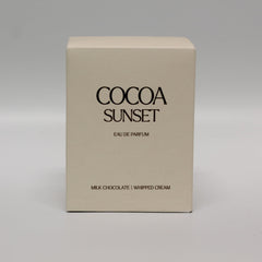 Zara Cocoa Sunset lifestyle scene with bottle near dessert props suggesting indulgent scent