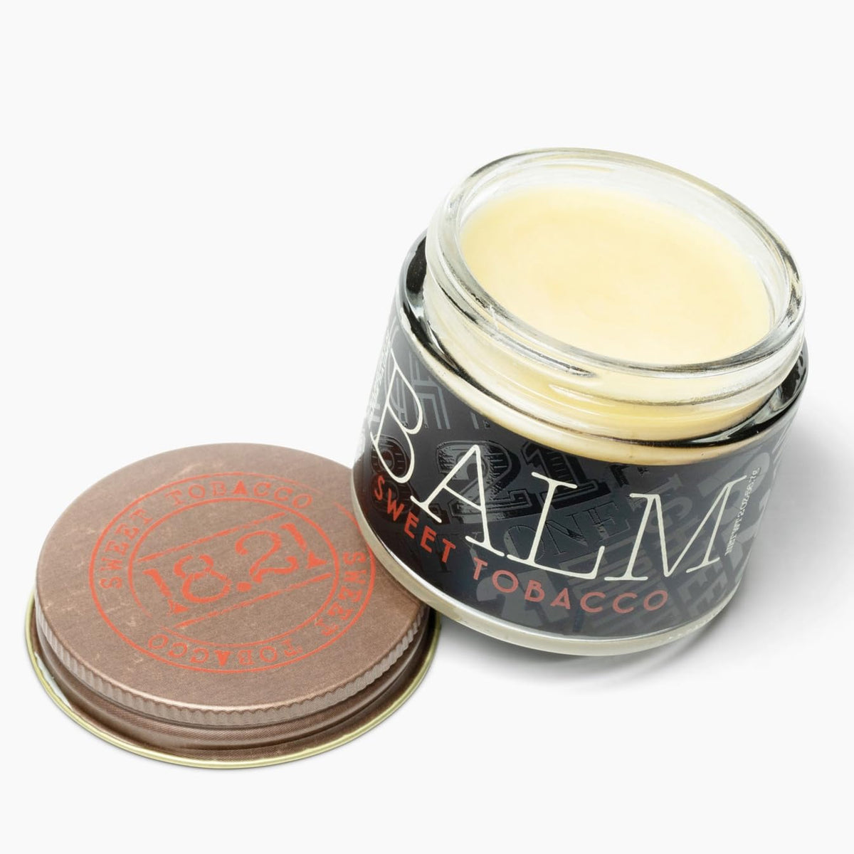 18.21 Man Made jar front showing label and compact 2 oz size benefit
