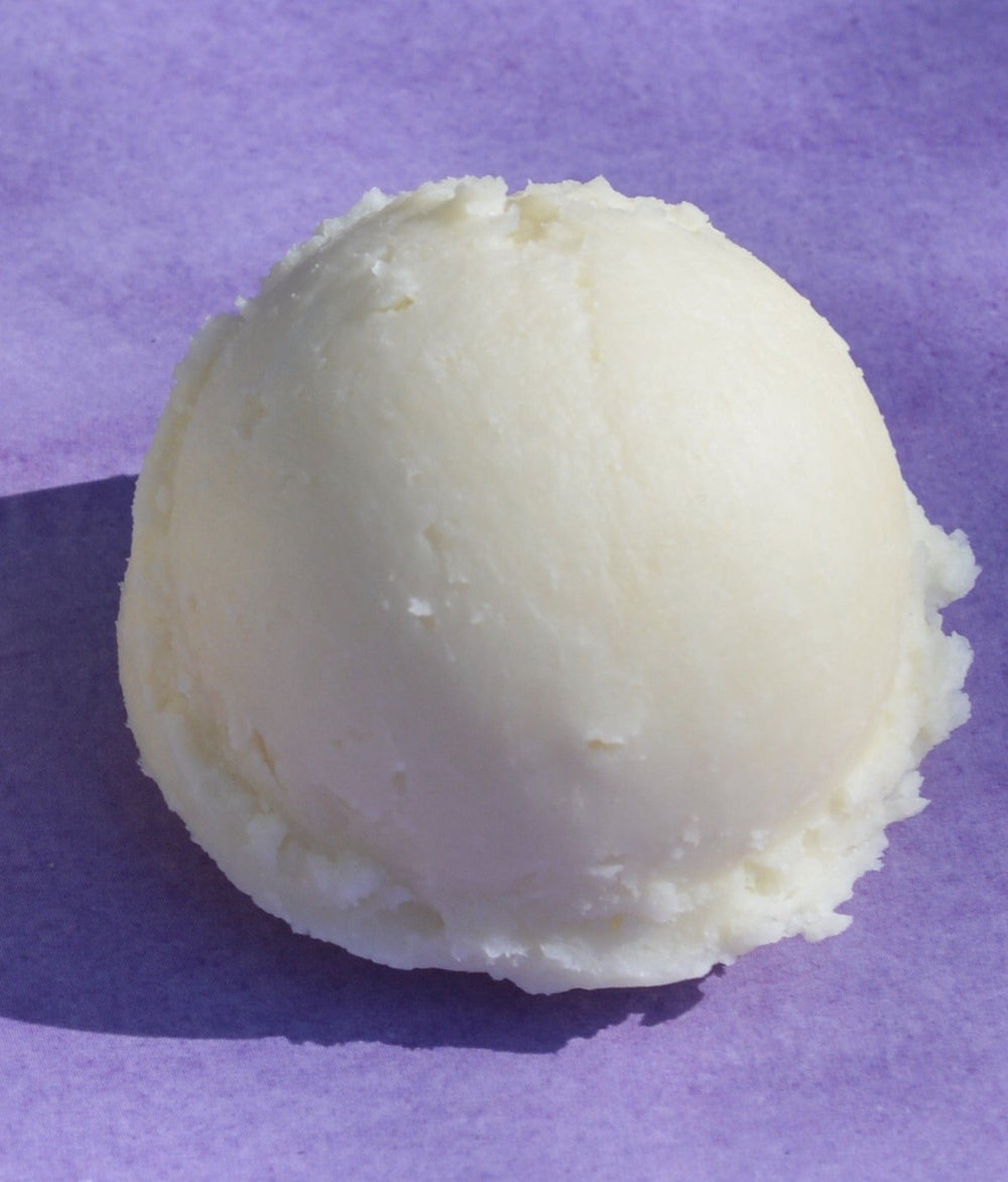 3CAYG mango butter next to measuring scale showing 5LB quantity
