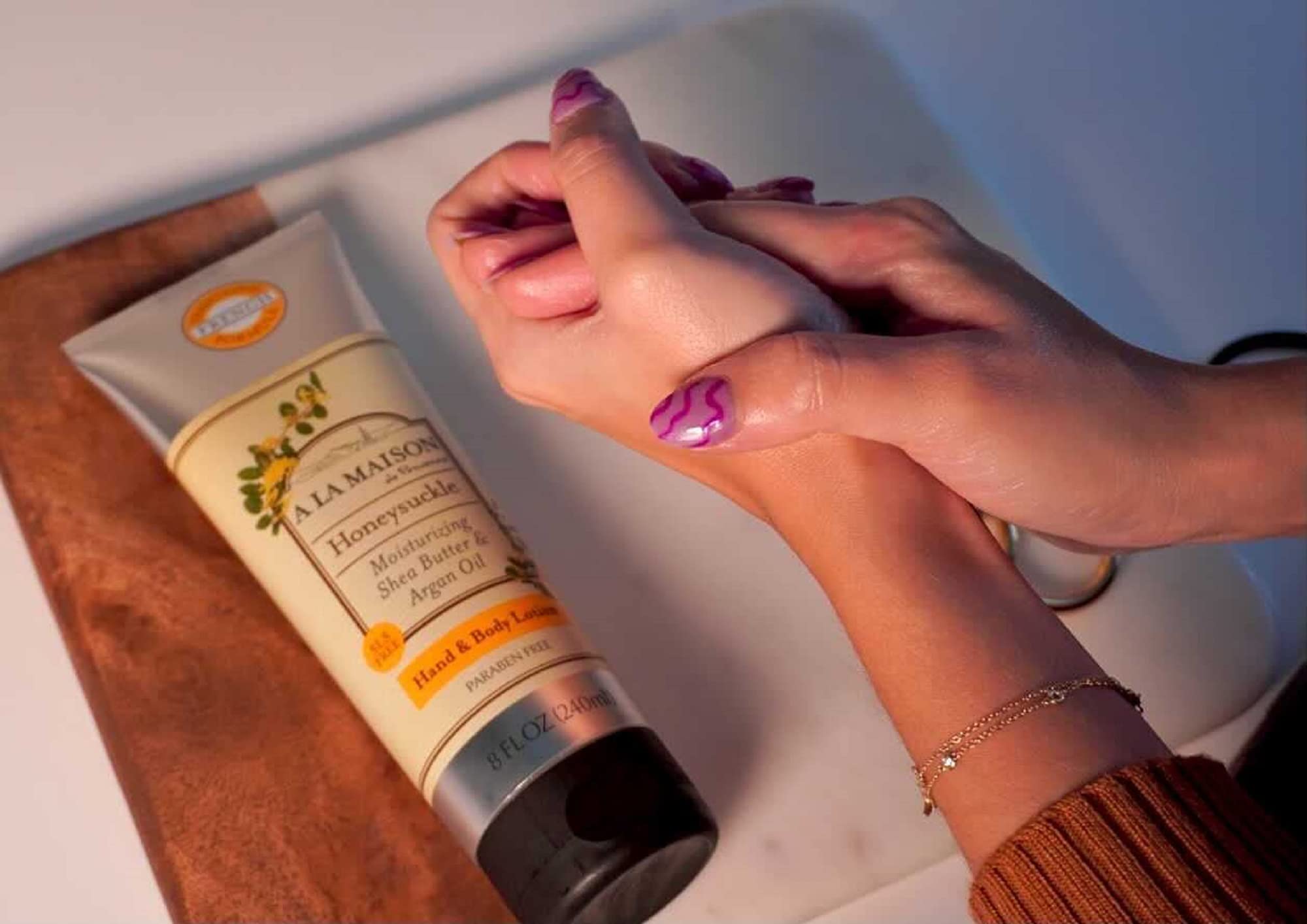 A LA MAISON applied to hand showing smooth finish and immediate softening benefit