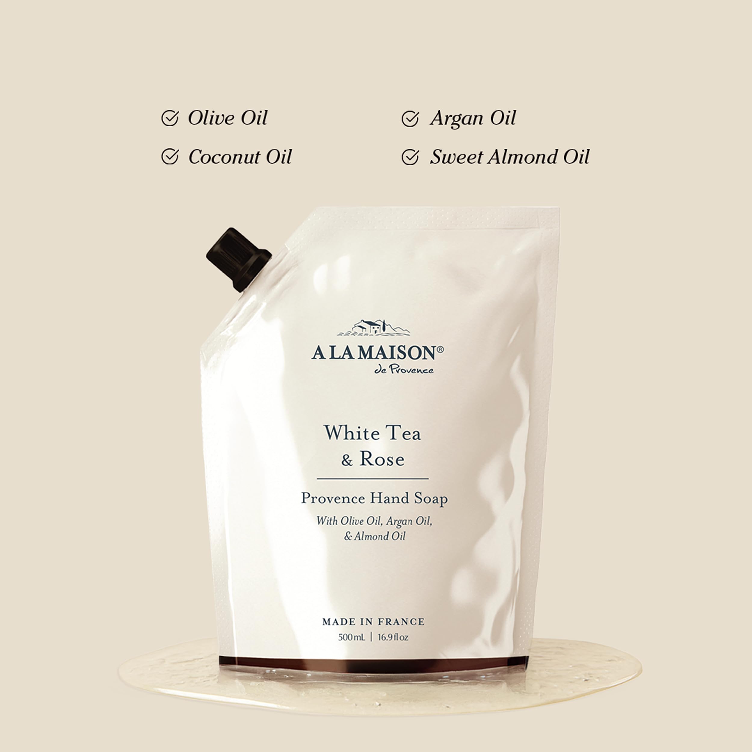 A LA MAISON label close-up highlighting fragrance and botanical benefits