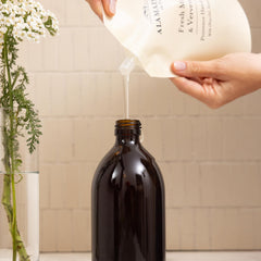 A LA MAISON creamy lather texture demonstrating gentle nourishing cleanse