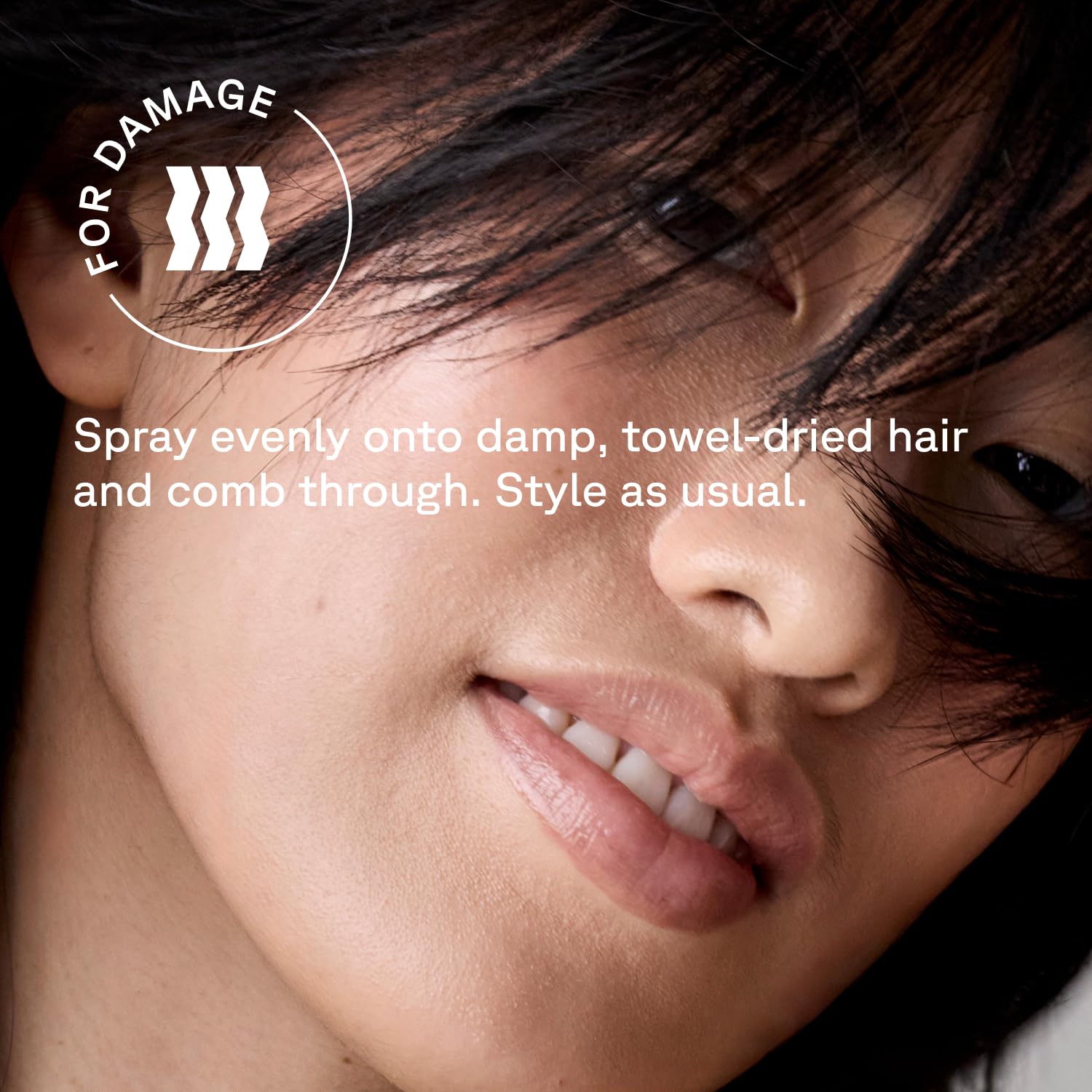 Acure Bonding being sprayed on towel-damp hair for detangling and softness