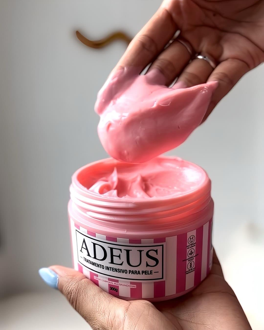 ADEUS used beside ruler for scale showing 300 g jar size and application coverage