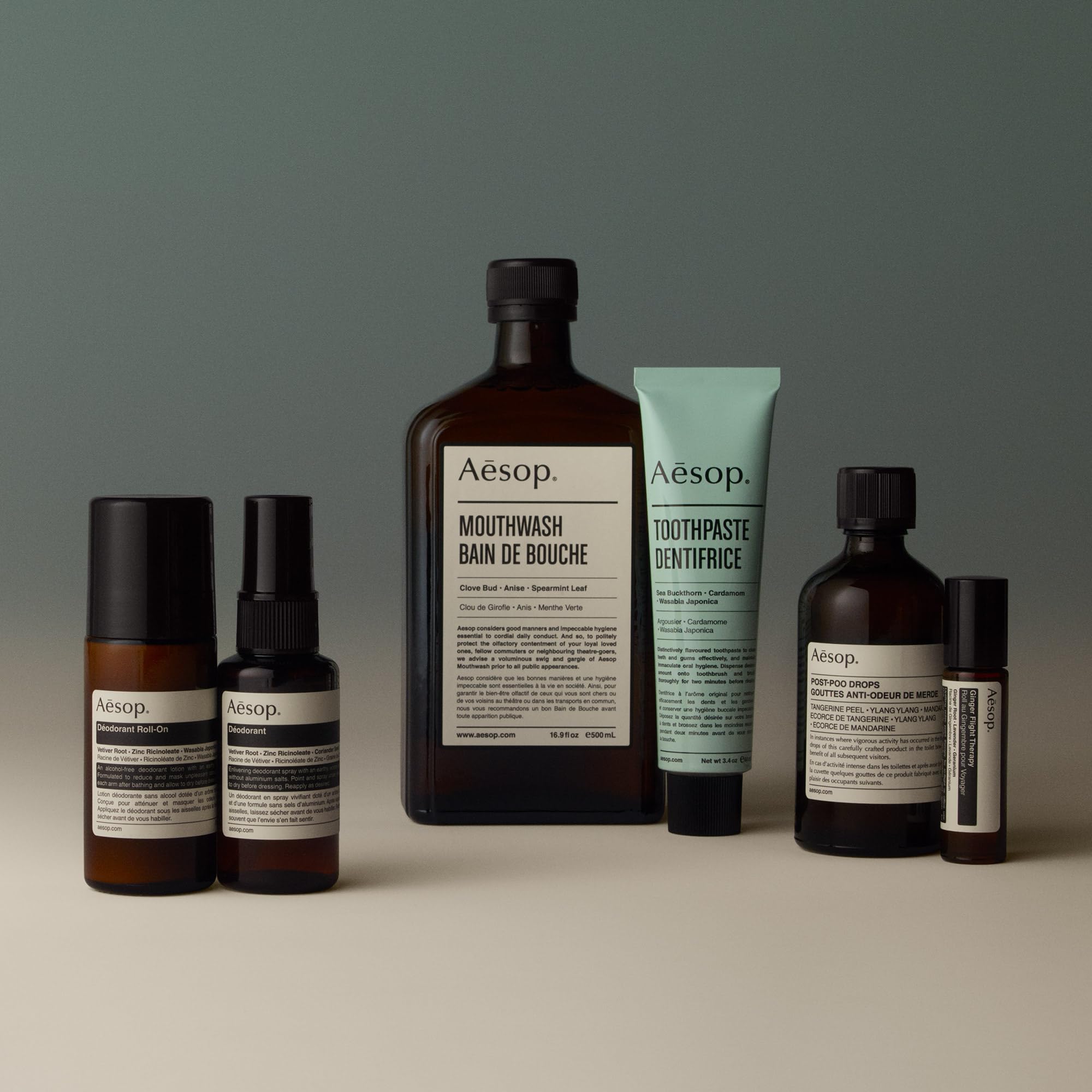 Aesop bottle beside common items showing 1.7 oz scale, portable benefit