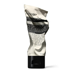 Aesop exfoliant paste front tube showing packaging and size benefit