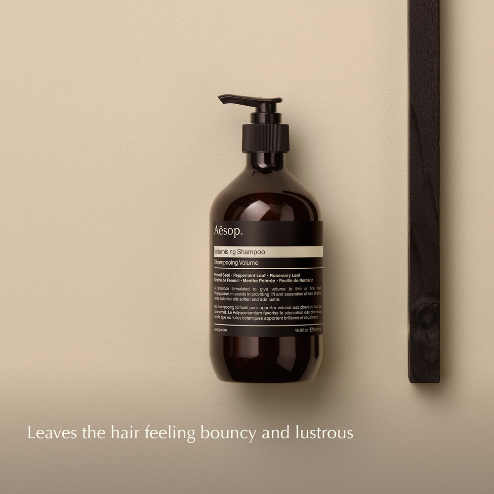 Aesop volumizing shampoo pump close-up highlighting easy dispensing