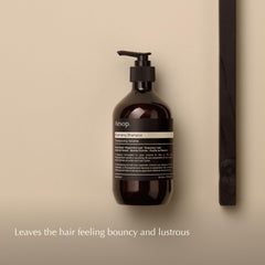 Aesop volumizing shampoo pump close-up highlighting easy dispensing