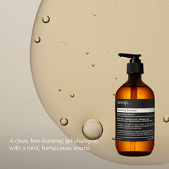 Aesop volumizing shampoo creamy texture on hand showing lightweight feel