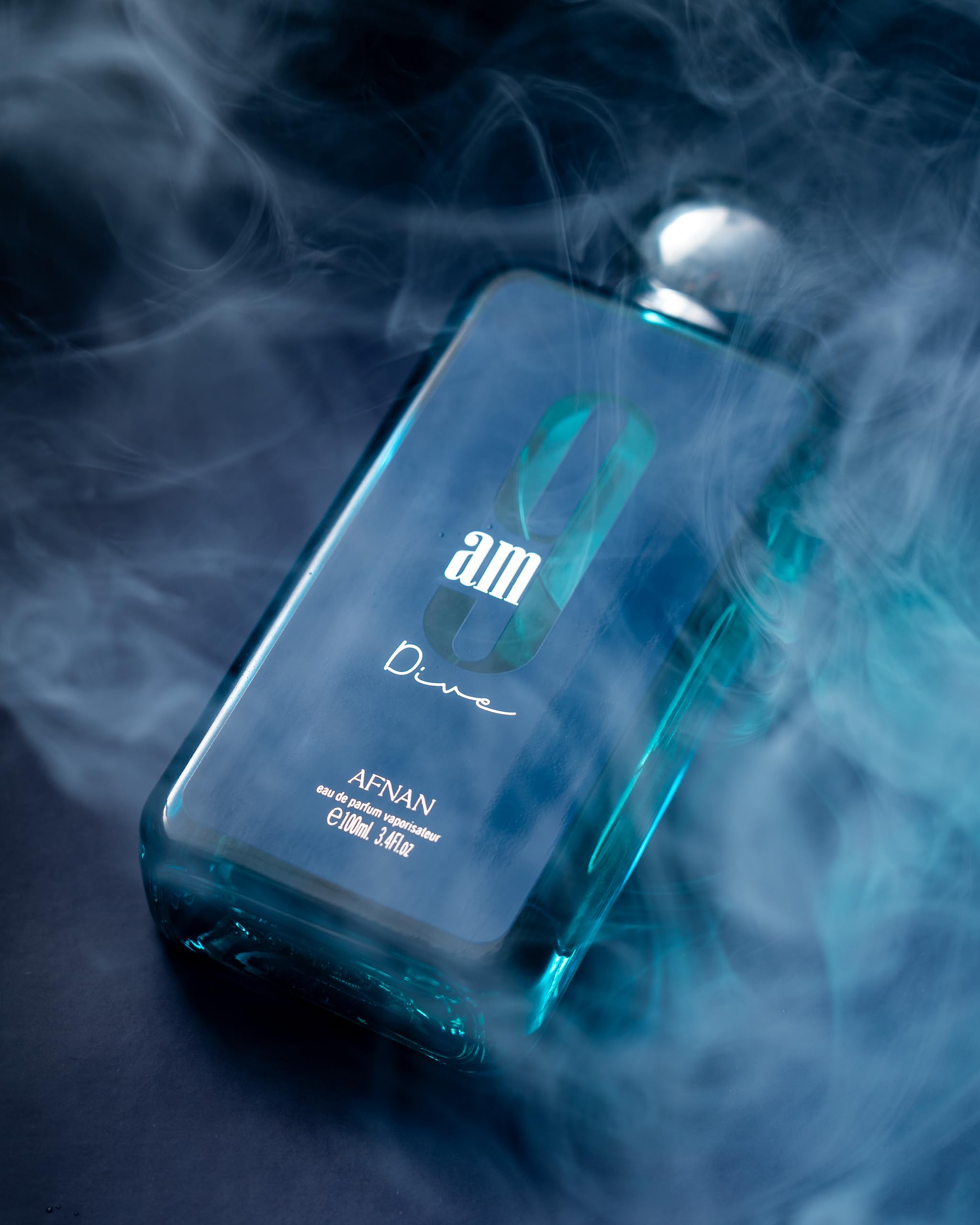 Afnan 9PM Rebel 100ml next to common items to show true size and portability