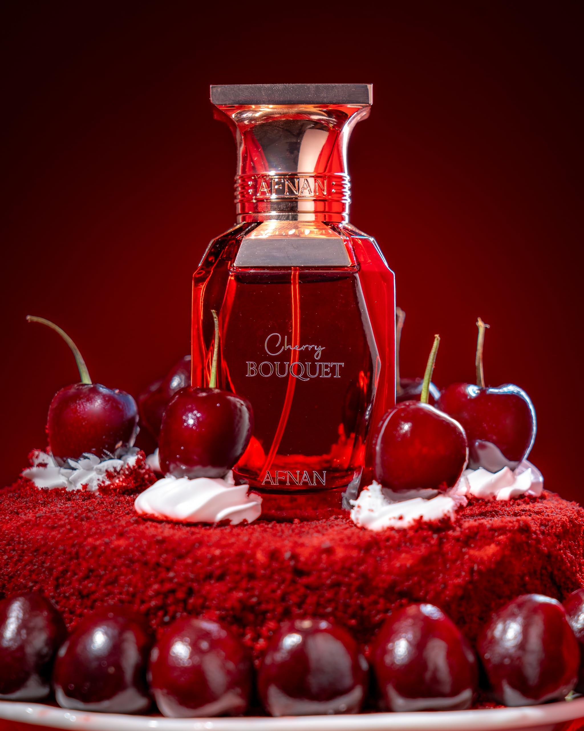 Afnan notes visual with cherries and roses representing fruity floral balance