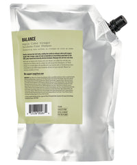 AG Care refill pouch being poured to reduce plastic waste