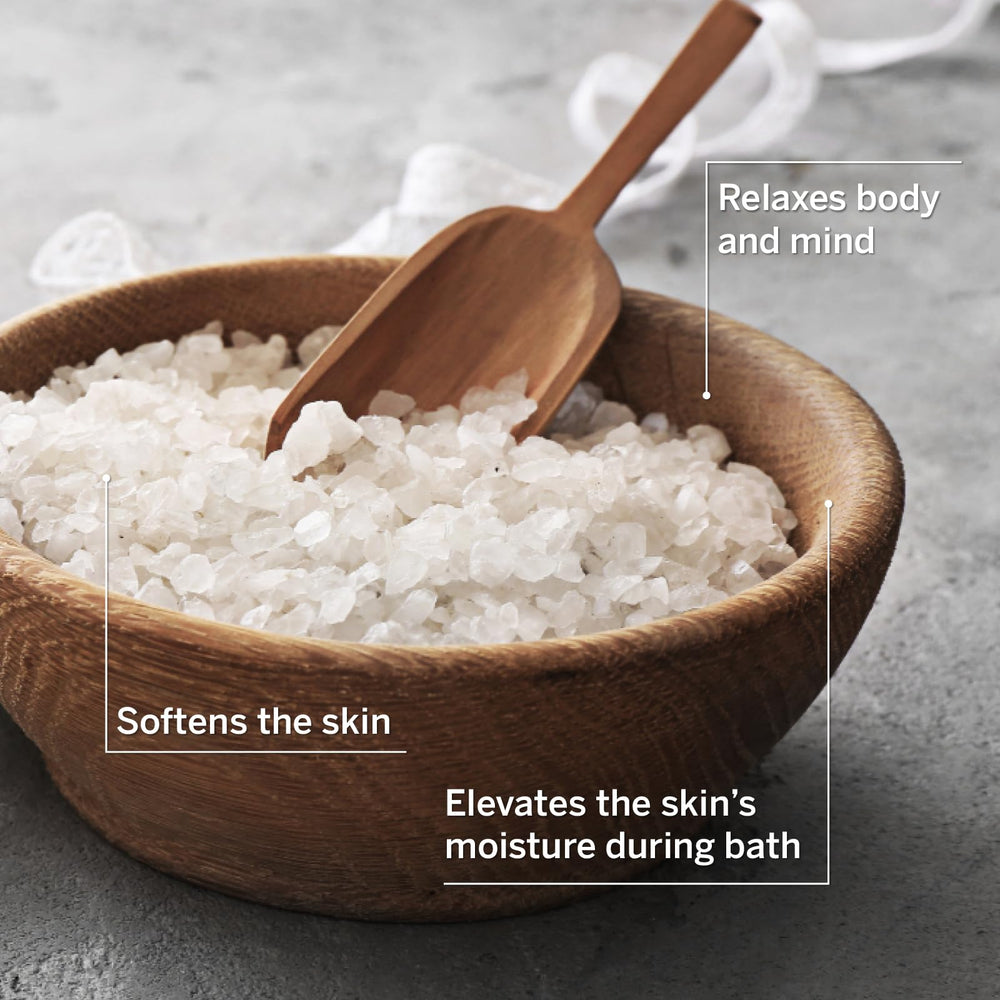 AHAVA pouring salt into bathtub, demonstrates easy use and relaxation benefit