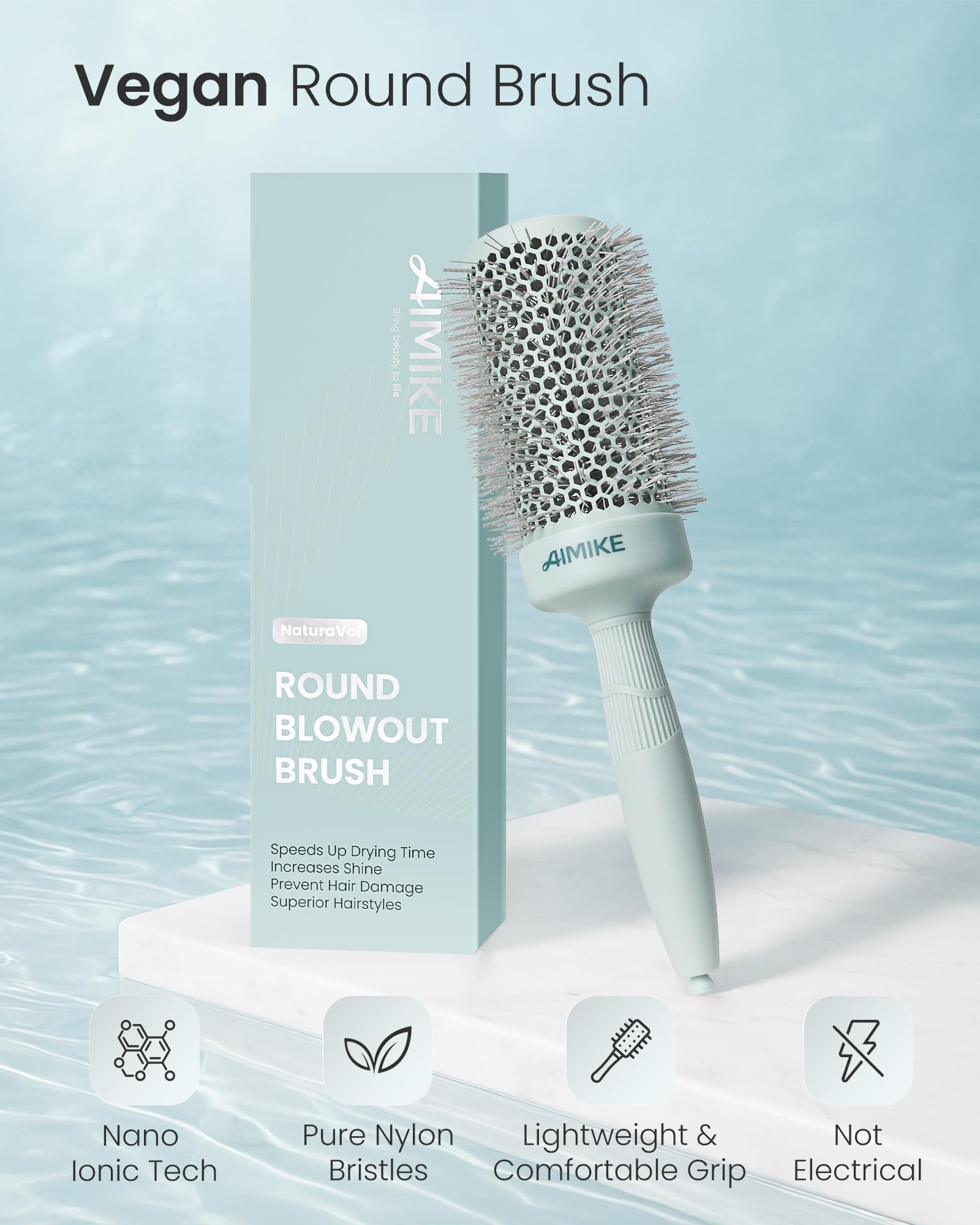 AIMIKE in-use blowdry model using brush to create volume and smooth finish
