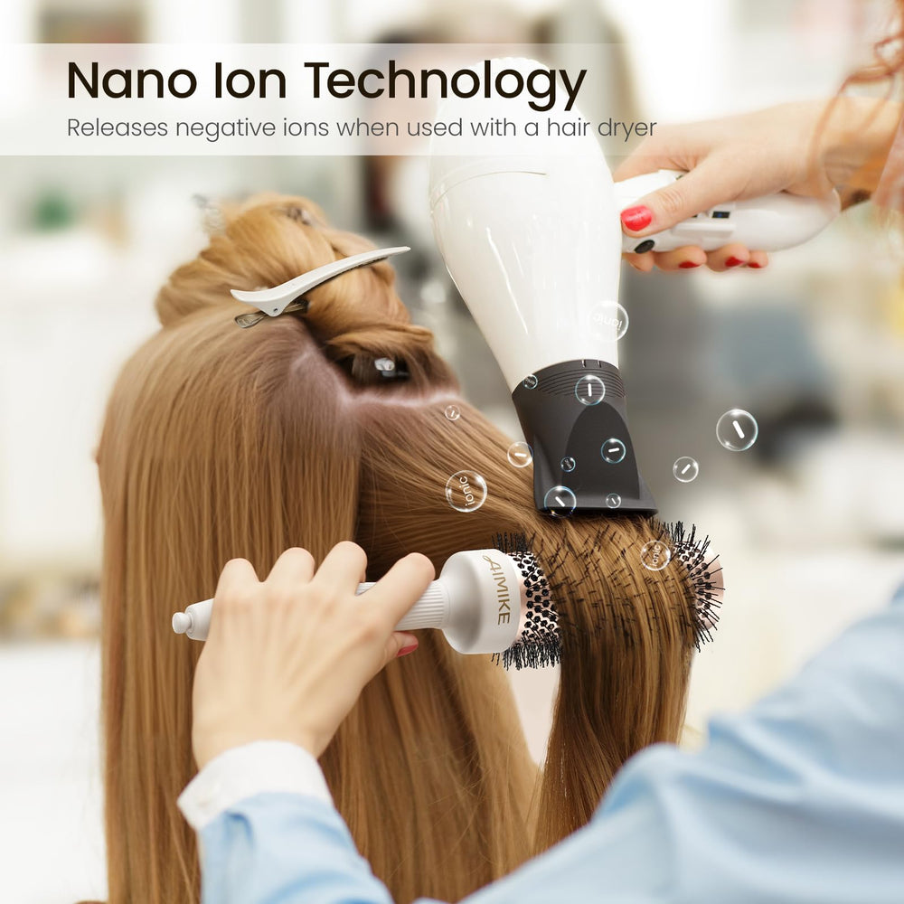 AIMIKE brush in use during blowout to create natural volume and smoother finish