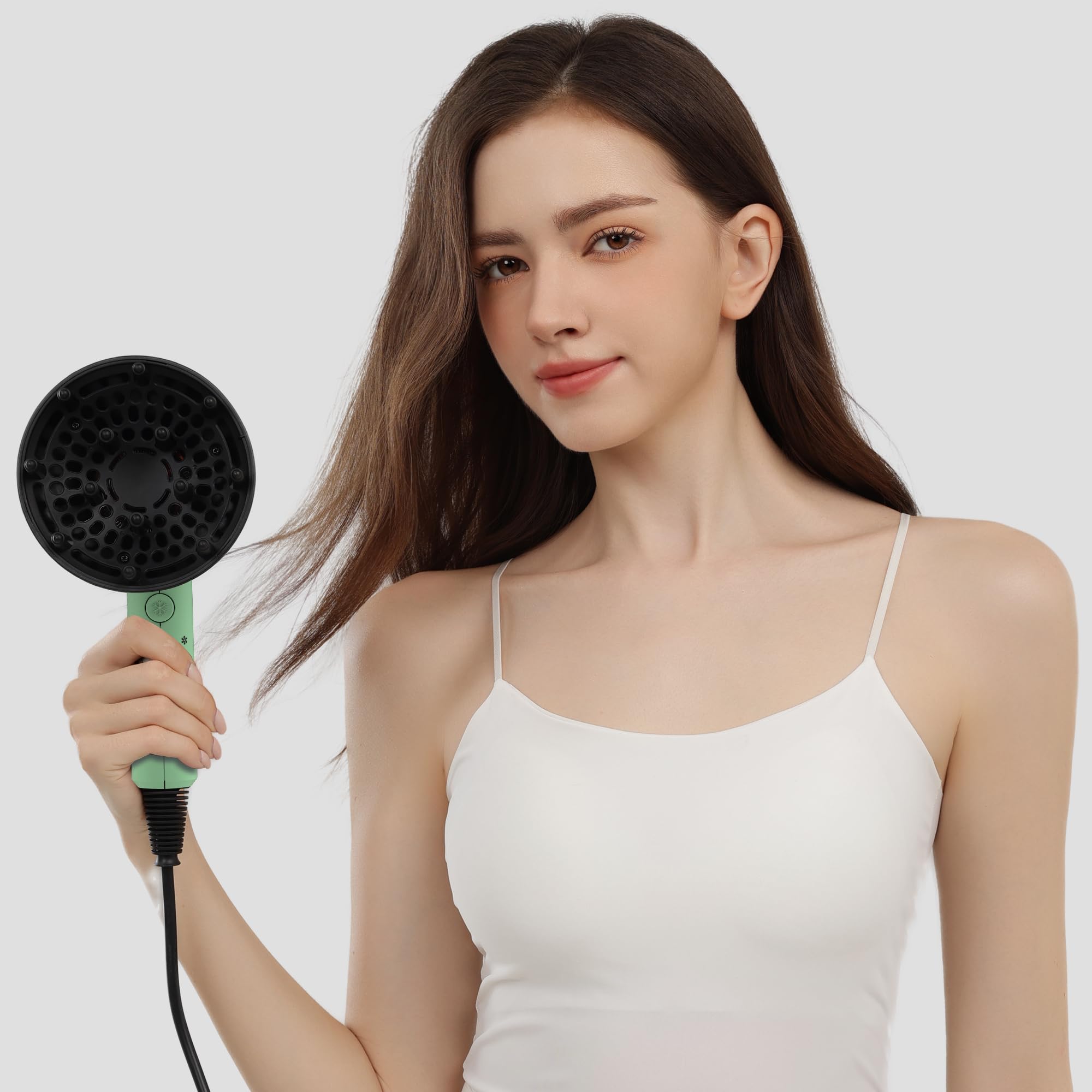 AINA dryer on bathroom counter in styled scene to inspire everyday use