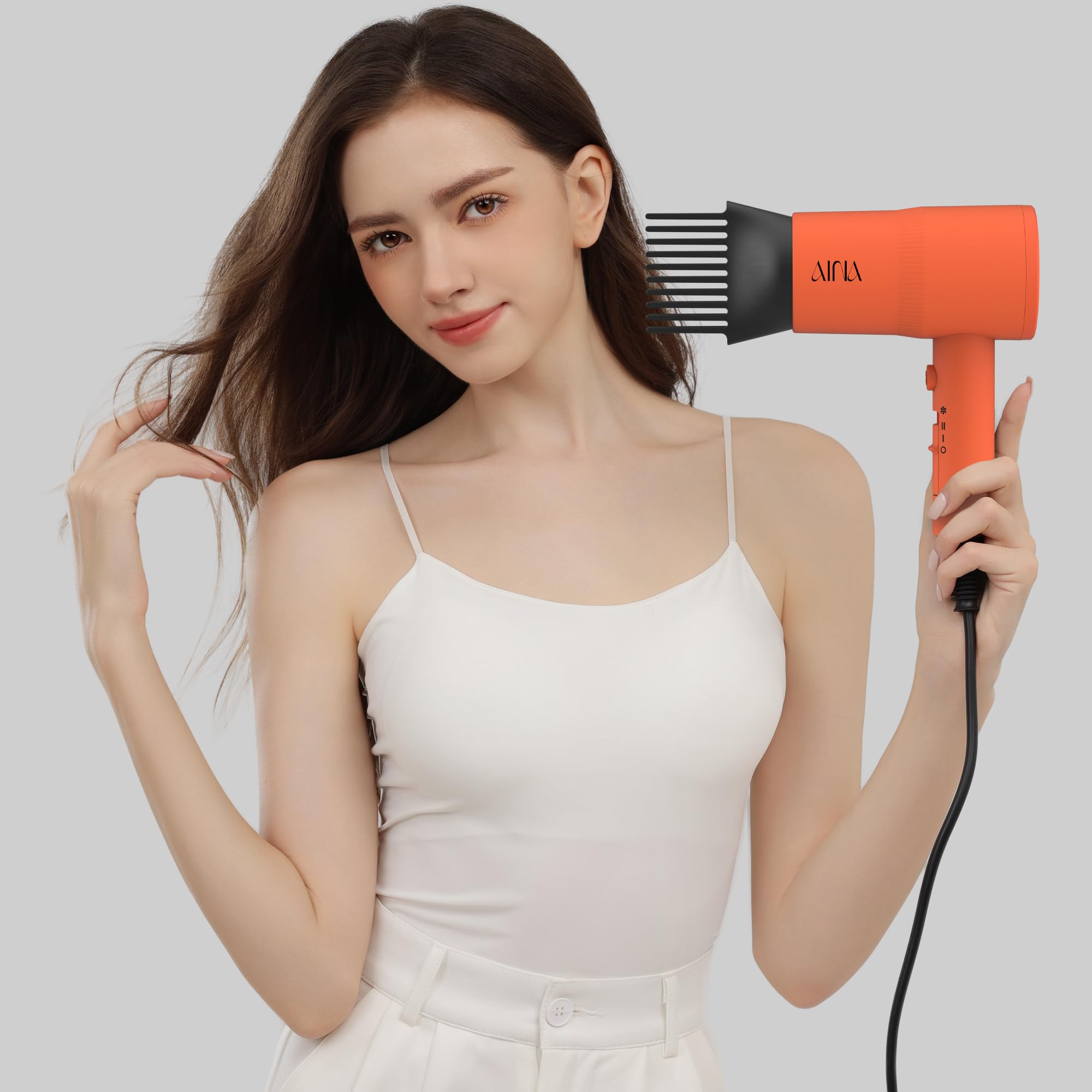 AINA dryer comb attachment demonstrating smoother straightening and detangling
