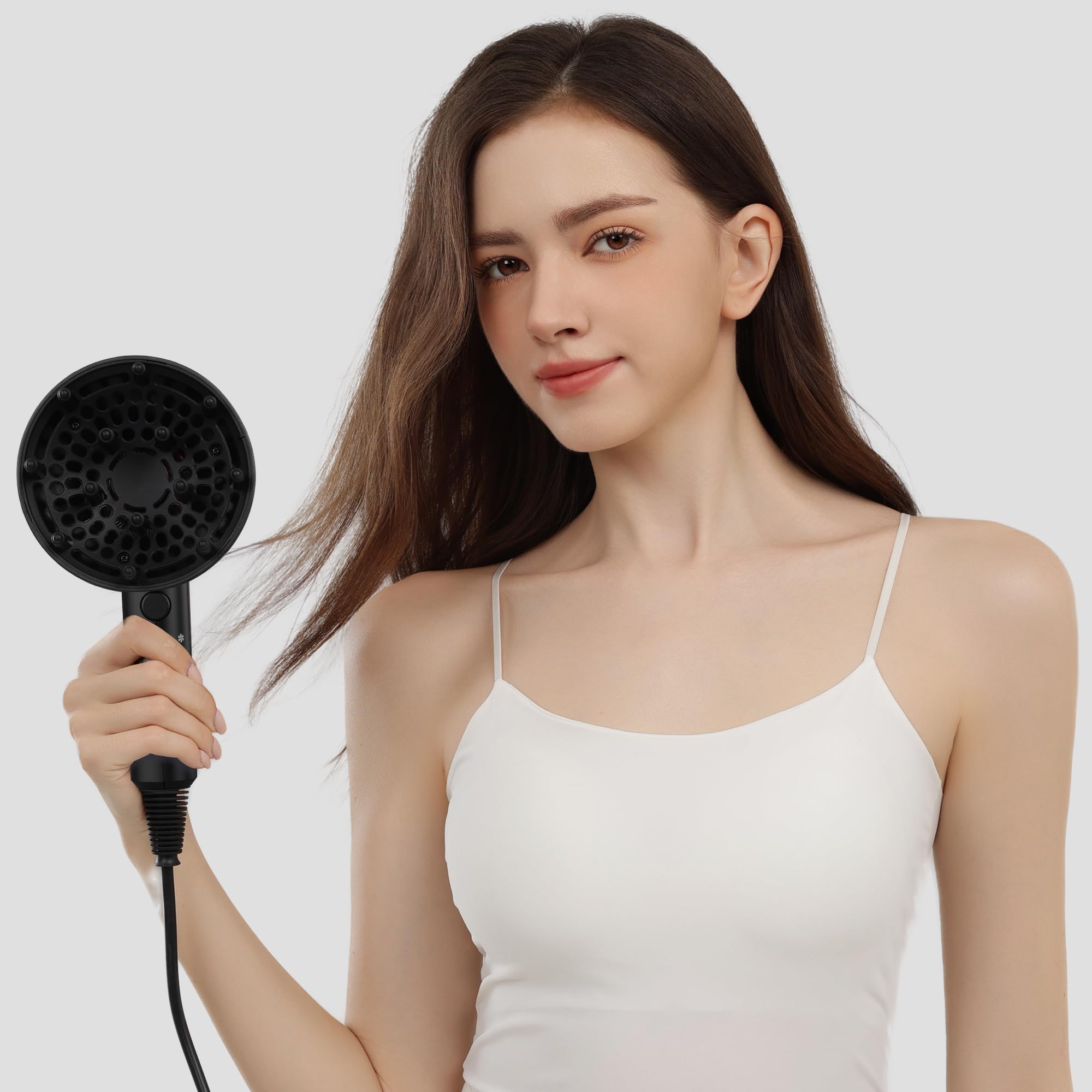 AINA hair dryer on bathroom counter styled with accessories for everyday convenience