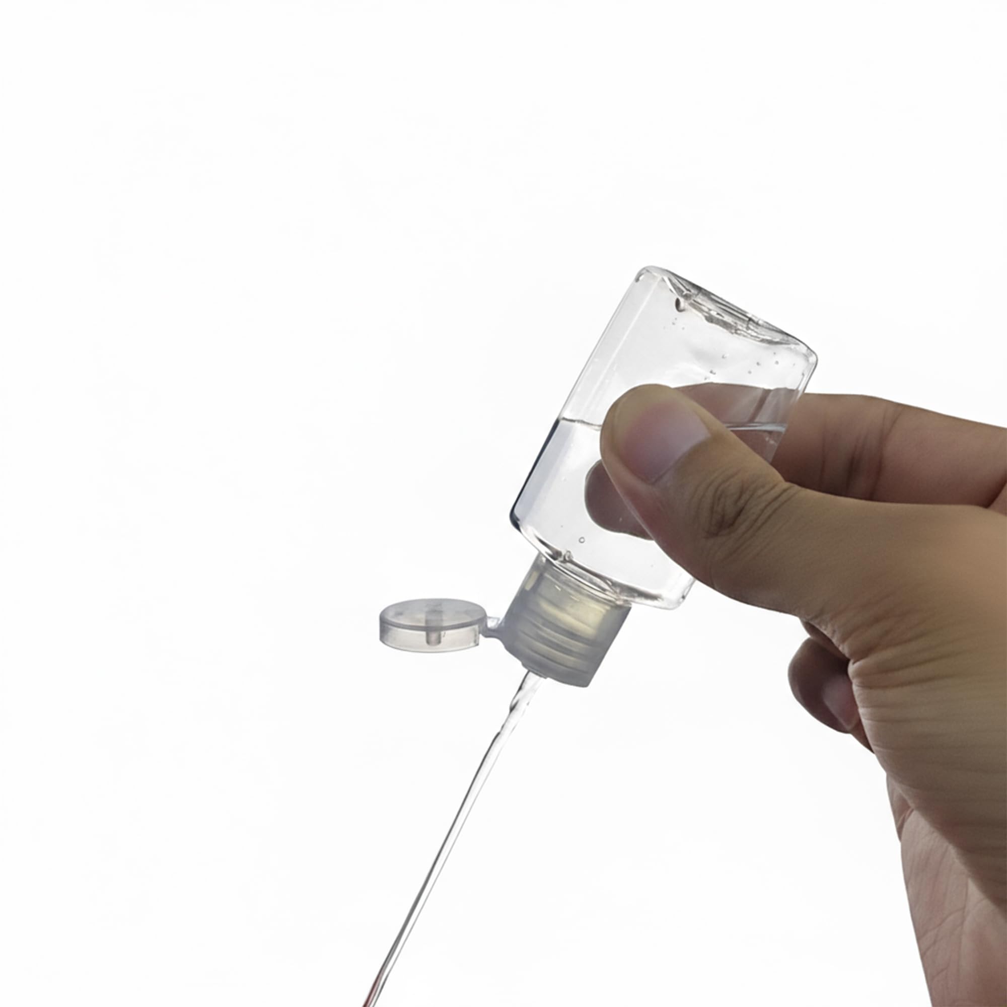Ainiktozoon bottle held in hand showing 1 oz scale and portability