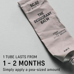 Hand holding AKT 50mL tube to show size and portability for performers