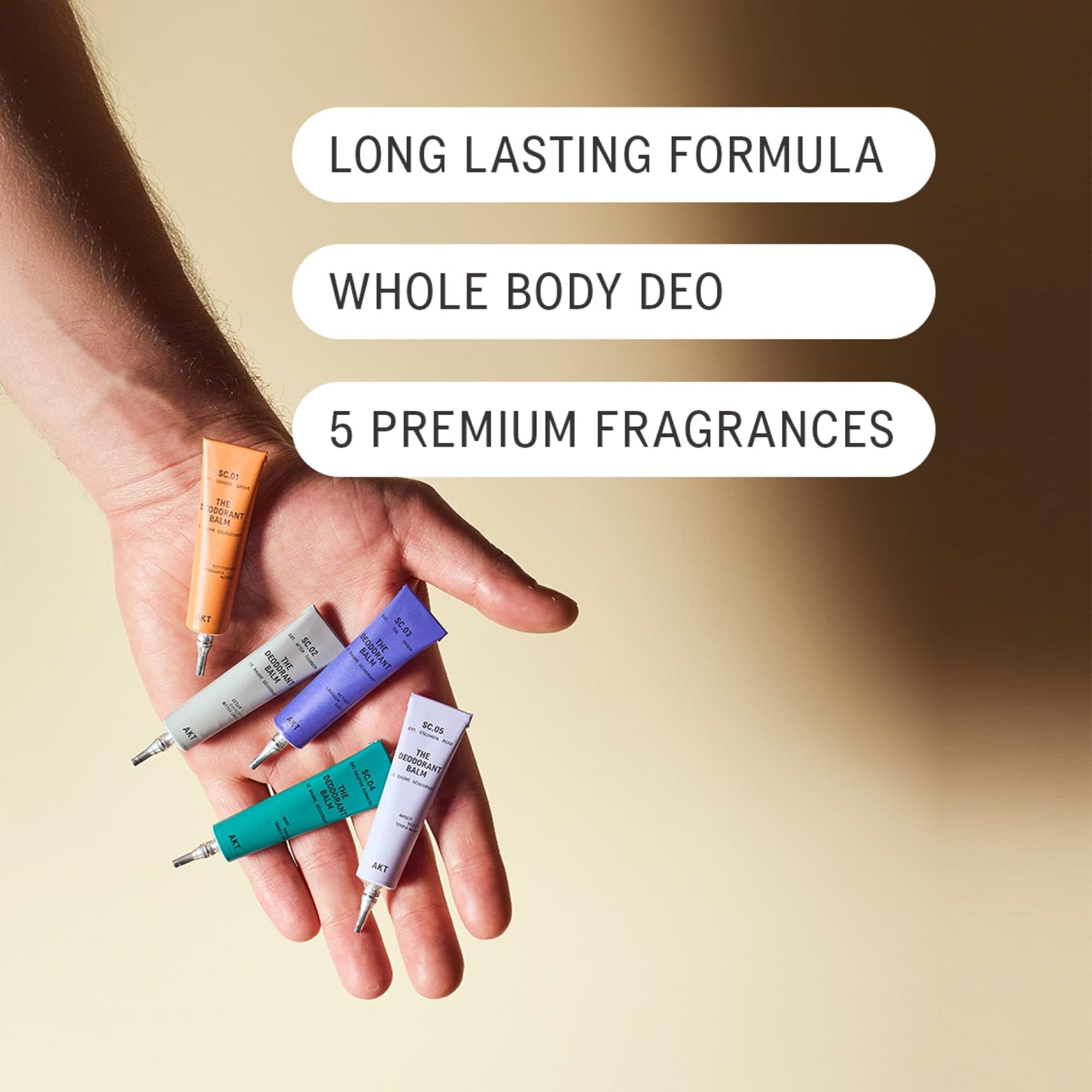 AKT mini balm open with product on fingertip for easy application