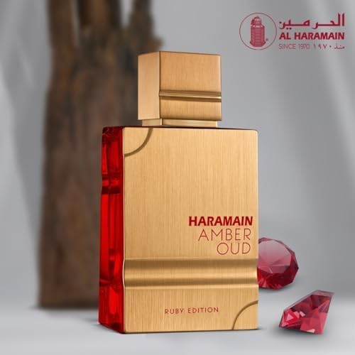 Hand spraying Al Haramain perfume showing 60ml portability and easy application benefit