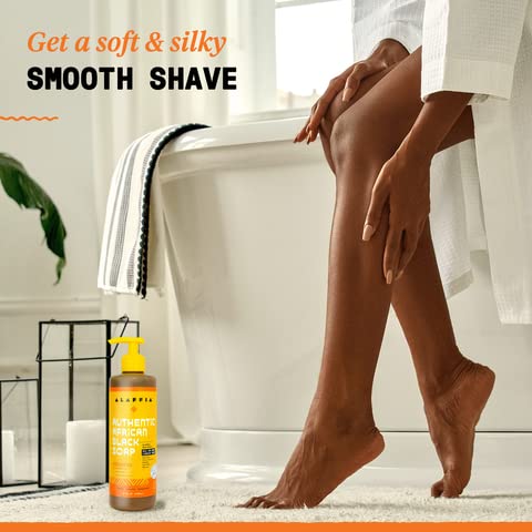 Alaffia bottle held in hand for scale indicating true 16 oz size and value benefit