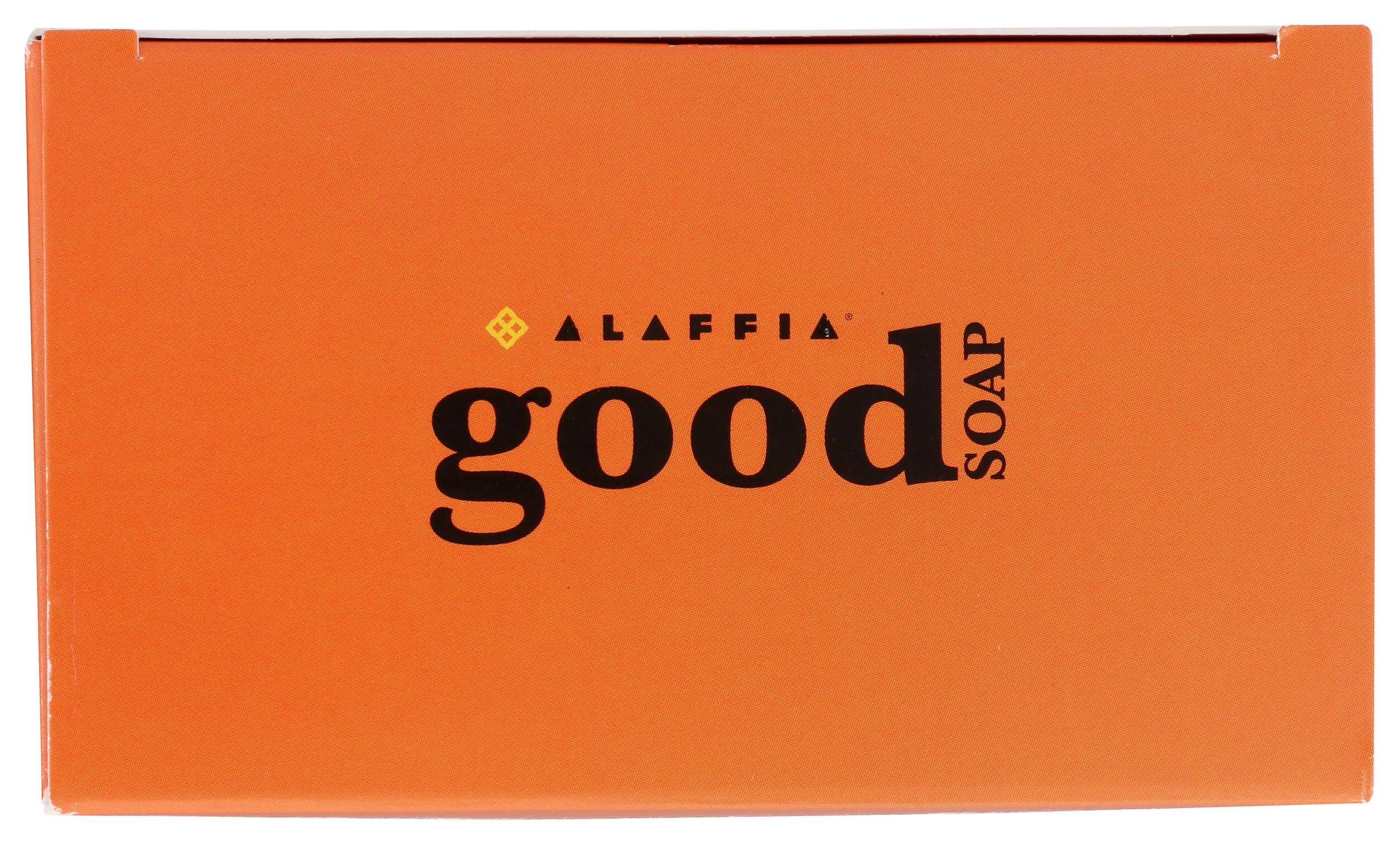 Alaffia two bars inside a travel toiletry bag demonstrating portability benefit