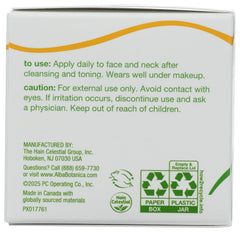 Alba Botanica jar in hand demonstrating 3 oz scale and travel convenience
