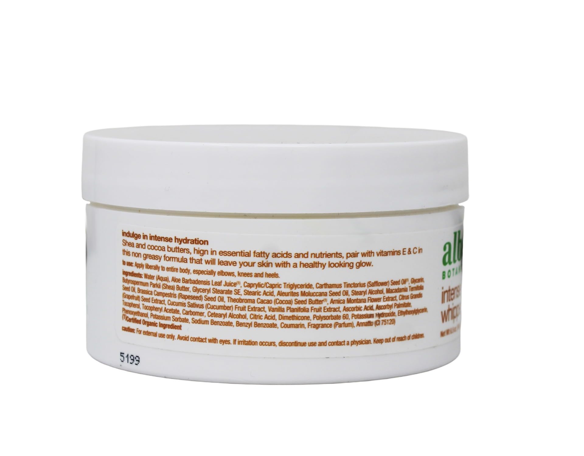 Alba Botanica body cream staged in bathroom setting suggesting routine use and travel convenience