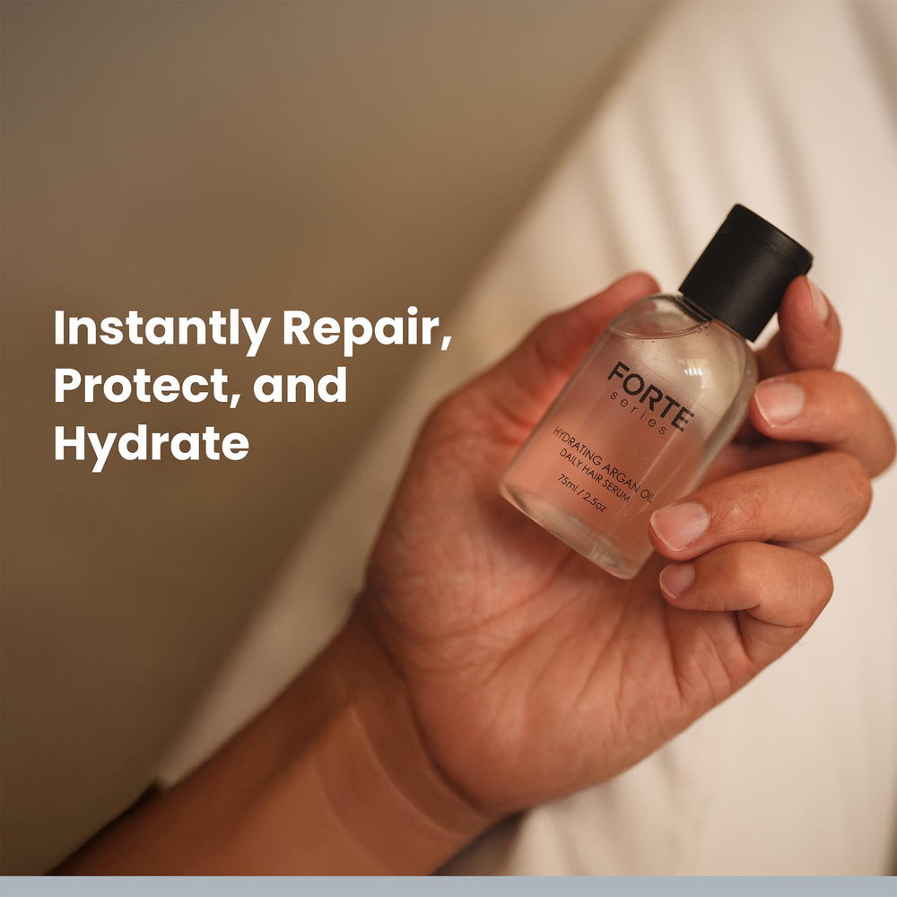Alex Costa bottle on bathroom counter with styling tools for daily grooming routine