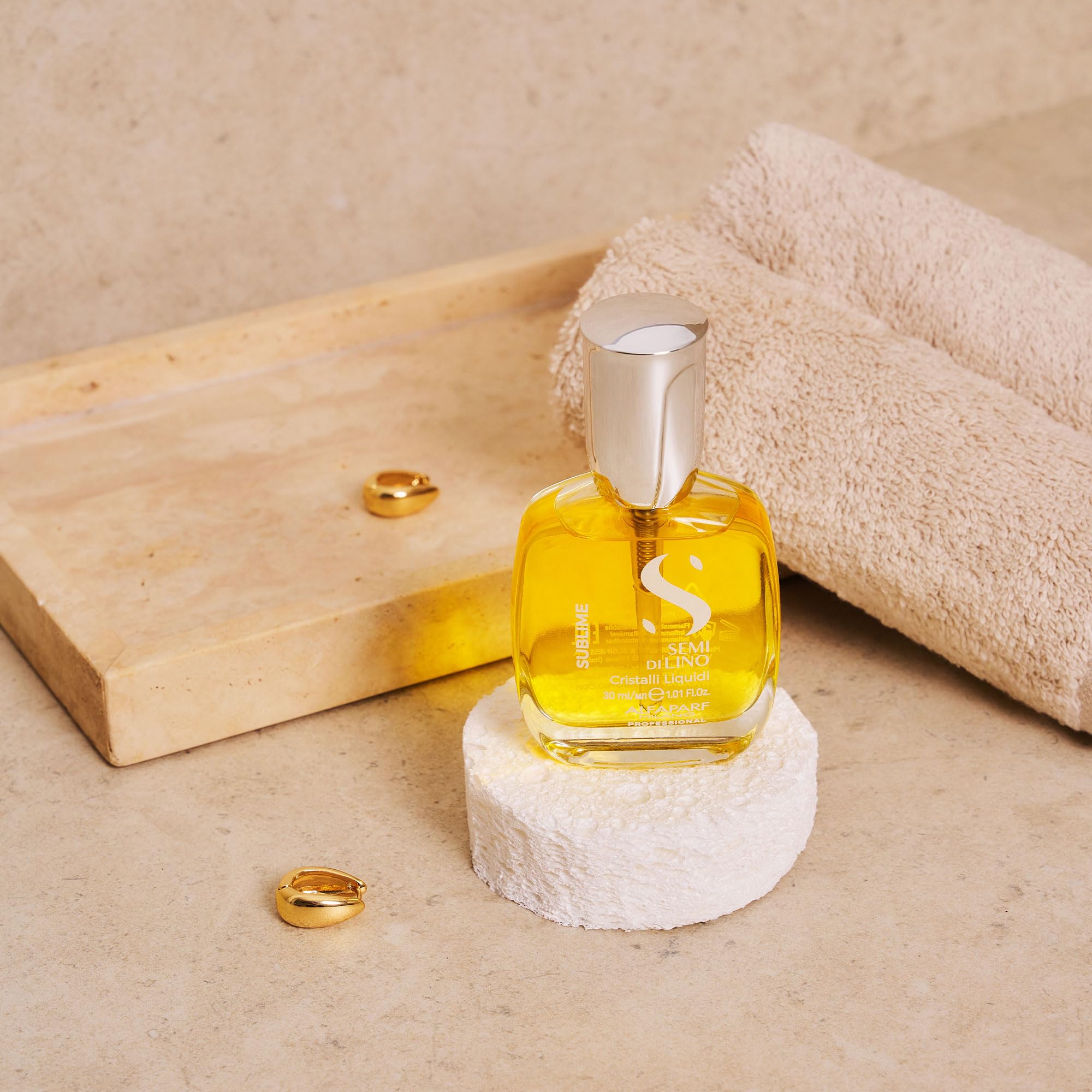 ALFAPARF MILANO bottle styled on bathroom shelf conveying daily routine convenience