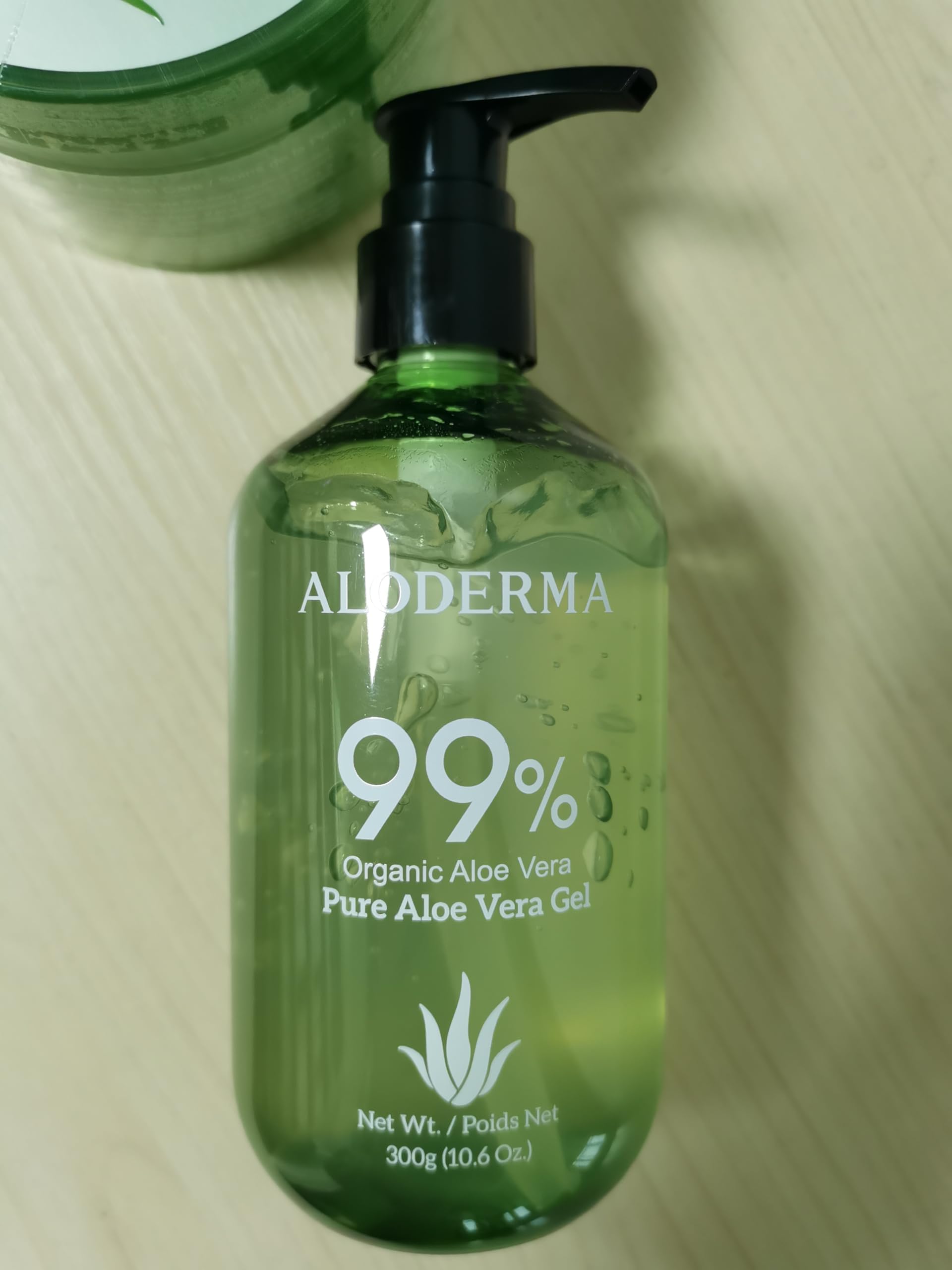 Aloderma being applied to hair and scalp for moisture without weighing hair down benefit
