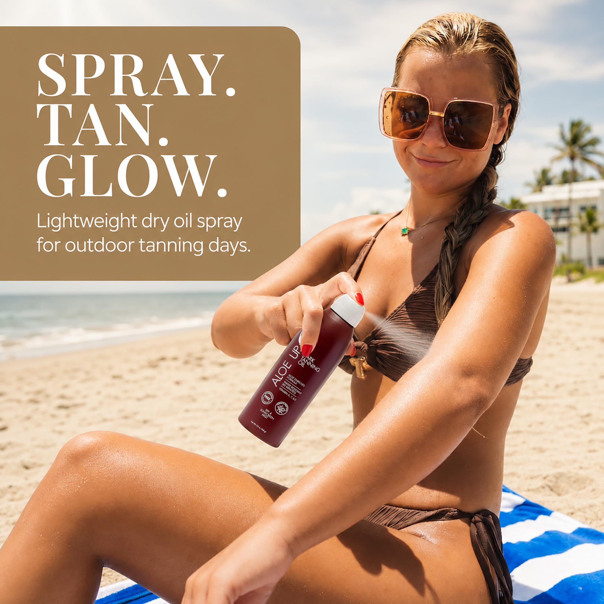 Aloe Up bottle on beach towel promoting travel-friendly tanning