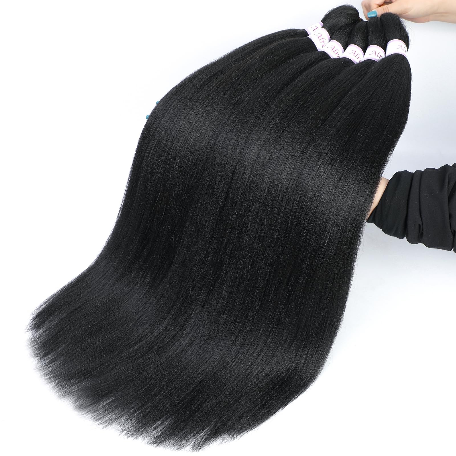 Alrence hair dipped in hot water demonstrating easy styling set