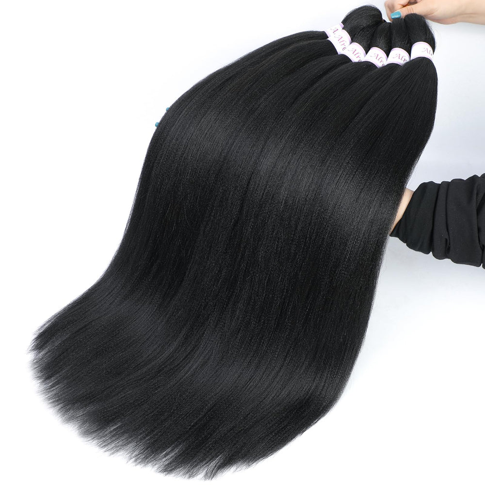 Alrence hair dipped in hot water demonstrating easy styling set