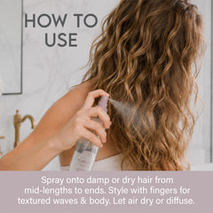 Aluram being sprayed on dry hair to add instant lift and touchable grit