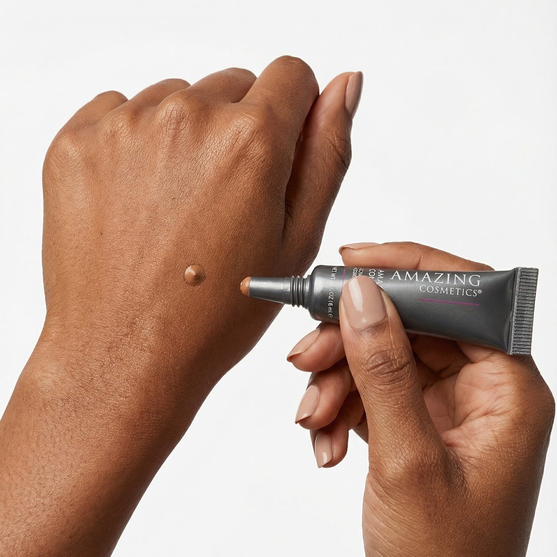 AmazingCosmetics tube inside a makeup bag showing travel-ready styling benefit convenient touch-ups